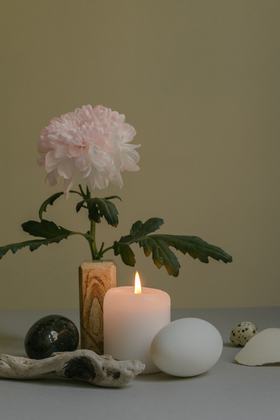 Lighted Candle and Flower